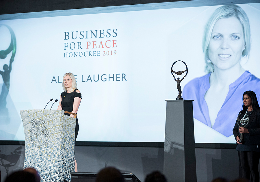 Alice Laugher accepting award Alice Laugher Business for Peace Award