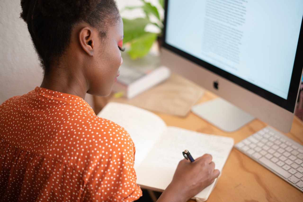 black woman at desk