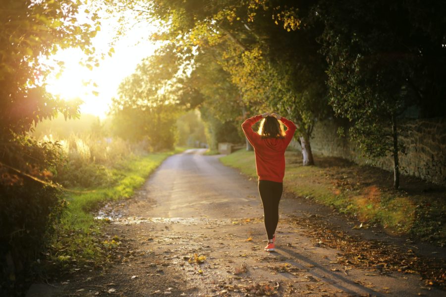 child walking on sunny road